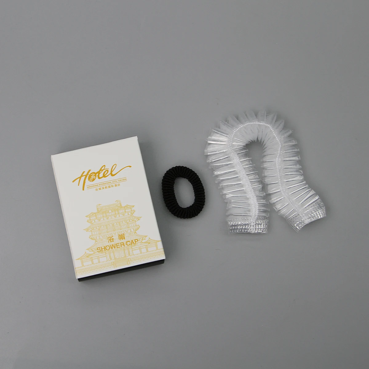 Precio al por Mayor Est&aacute;ndar Reciclado Global Gorros de Ducha Desechables Impermeables para Hotel para Mujeres Gorros de Ba&ntilde;o para Beb&eacute; con Ajuste Suave